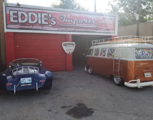 Eddie's Imports store front with vintage Porsche and retro VW van